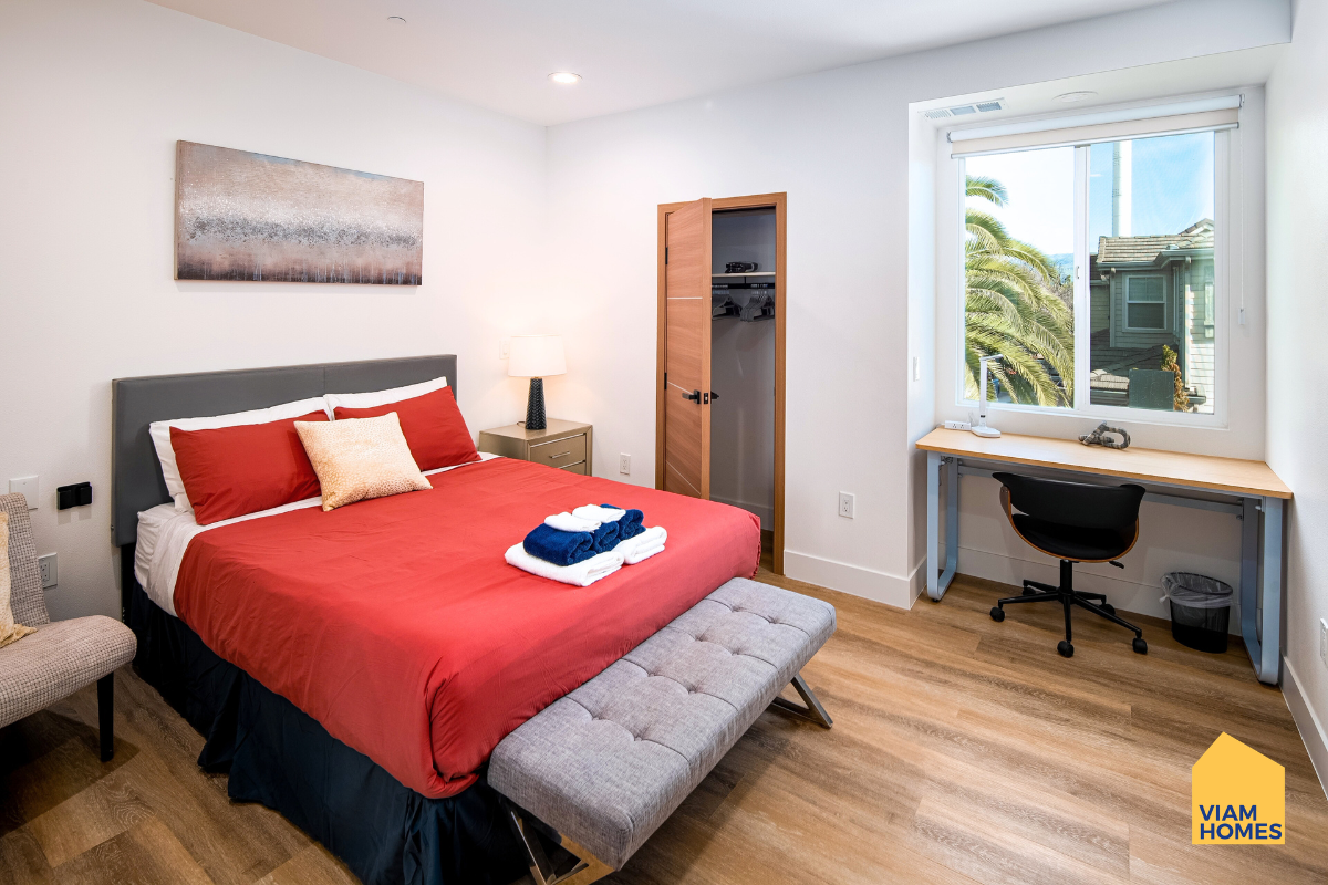 A private bedroom with an ensuite bathroom, plus a mini-kitchenette, by VIAM Homes