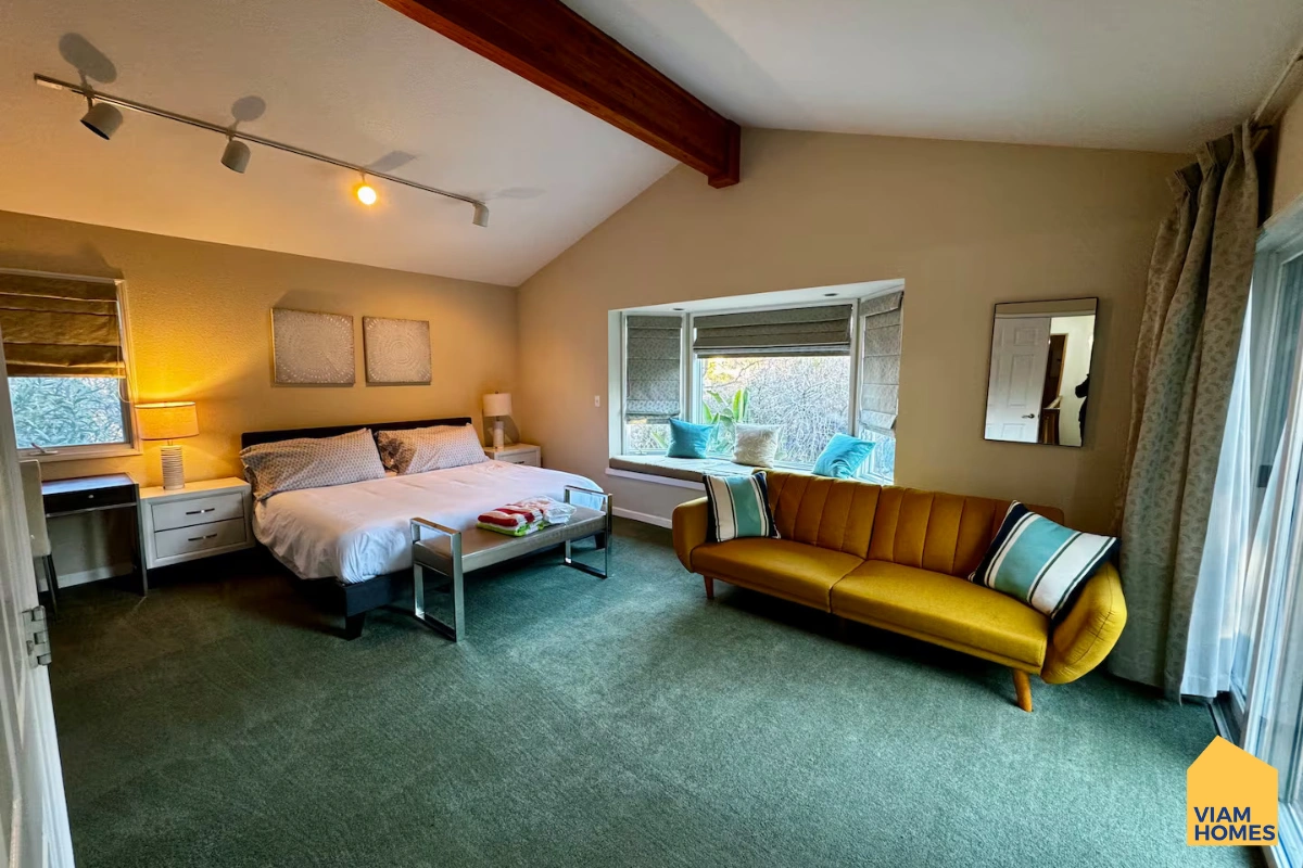 A bedroom at Fleming Villa San Jose by VIAM Homes