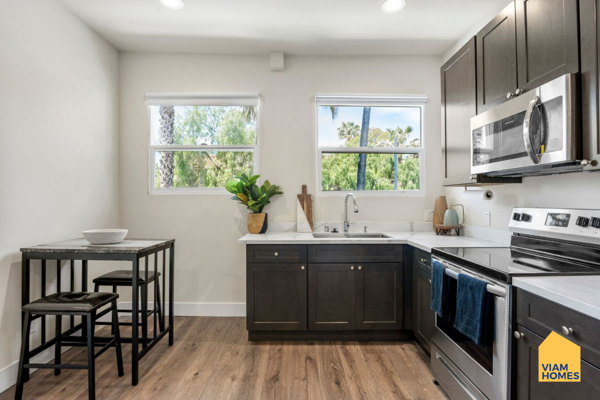A complete private kitchen and dining area at VIAM Homes furnished studio near San Jose City Hall & SJSU.